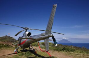 Waiting to take to the skies in a helicopter in Sicily, image by Angelo Giampiccolo, shutterstock