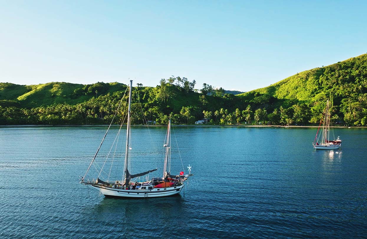 Sailboats anchored in Fiji, Image by Goinyk Production, Shutterstock Sailboats anchored in Fiji, Image by Goinyk Production, Shutterstock