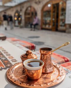 Traditional black bosnian coffee in beautiful copper cezve in Sarajevo, Image by Mazur Travel, Shutterstock
